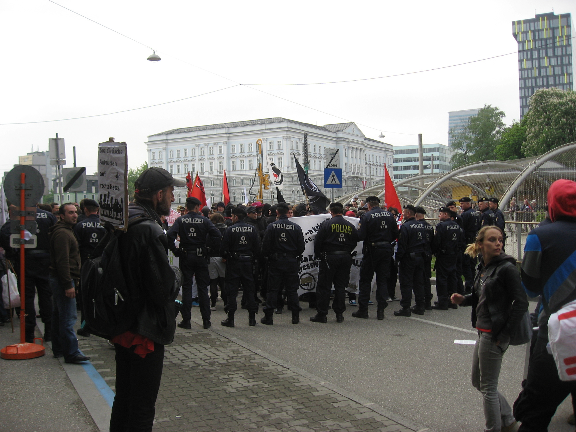 Police line and demonstrators