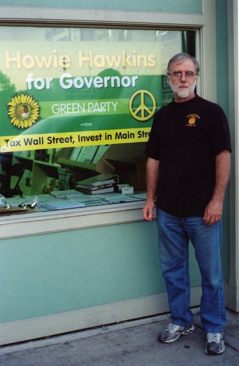 Howie Hawkins in front of the Syracuse Green Party office.